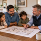 Family reviews a home floor plan with an inspector to assess comfortable room capacity.