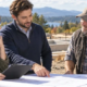 Homebuilder comparing construction loan options with a lender and contractor