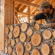 Cordwood wall built from short wood sections set in mortar during home construction