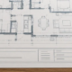 Architectural plan sheet with a clearly divided title block for project details, drawing number, scale, date, designer, and revision tracking.