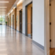 Corridor and hallway access in a building: a long main passage connects multiple rooms, while a shorter hall serves adjacent spaces.