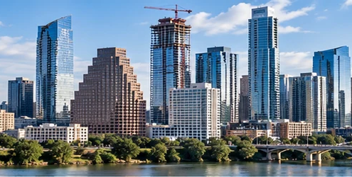 Daylight view of commercial and residential skyscrapers at different heights, illustrating the varied tower forms found in US cities.