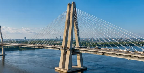 Cable-stayed bridge pylon supporting stay cables and deck over a river