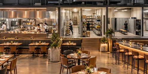 Restaurant back of house with kitchen, storage, staff corridor and mechanical spaces behind the guest dining area